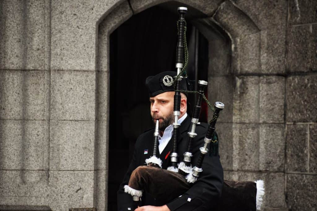 man playing the bagpipes