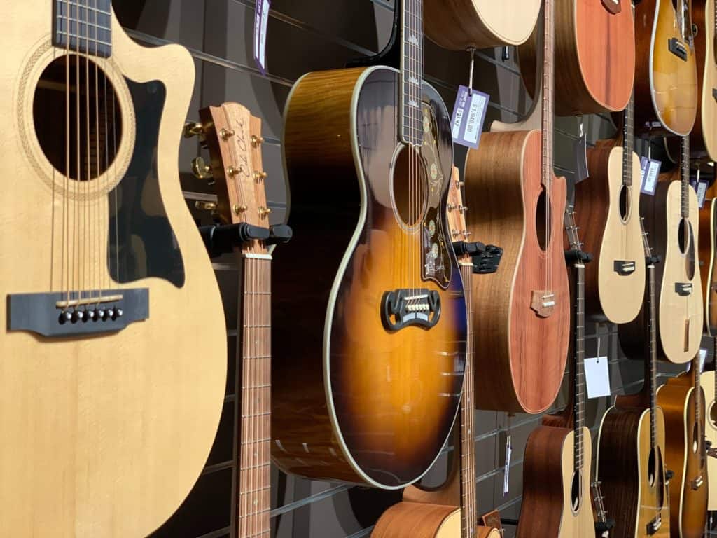 Acoustic guitars on display at a local guitar shop
