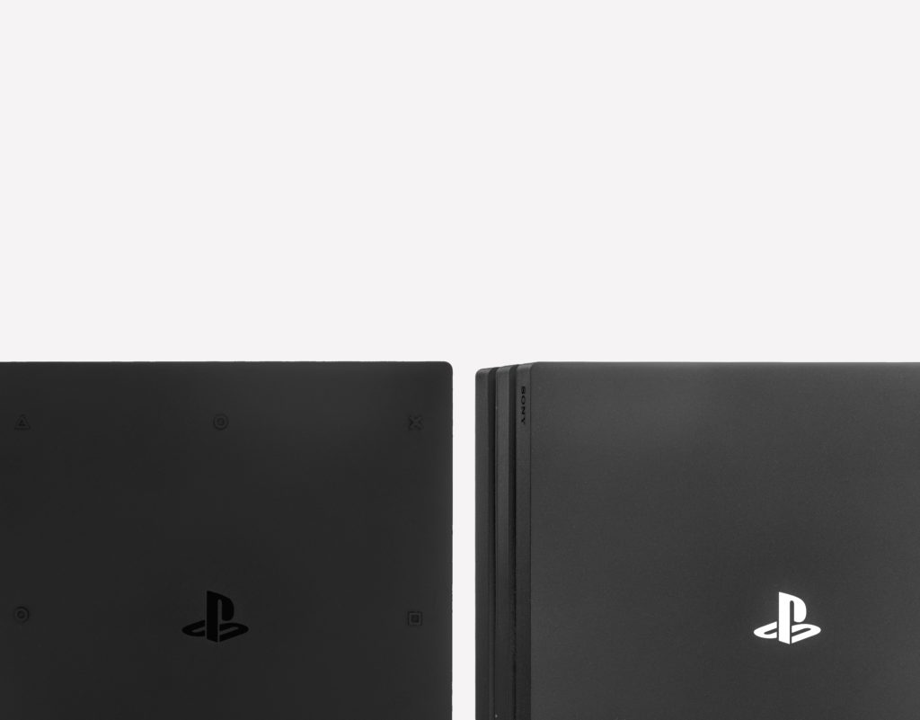 Two PS4 slim on a white background