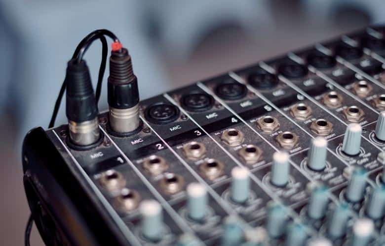 XLR sound connector plugged in to audio mixer