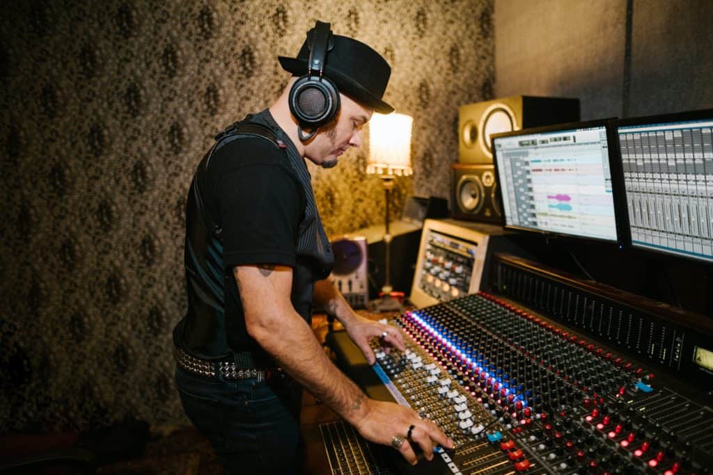 A man working inside a recording studio