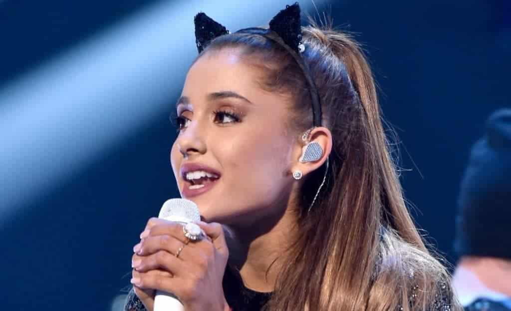 why-do-singers-wear-earpieces-when-performing-playthetunes