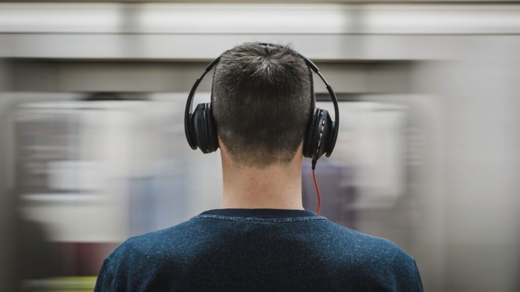 A photo of a person wearing headphones
